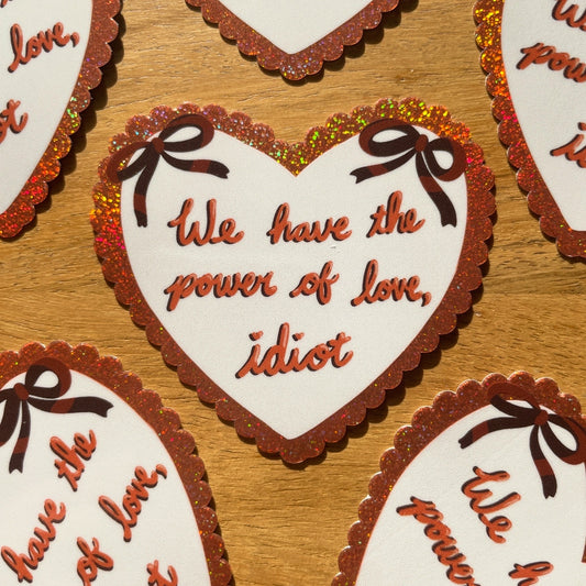 "We have the power of love, idiot" vinyl Sticker 3"