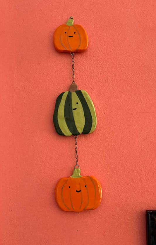 Trio of cutie pumpkins wall hanging