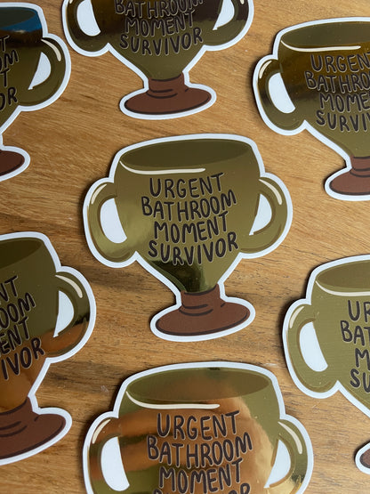 Urgent Bathroom Moment Survivor Metallic Gold Trophy Sticker