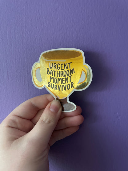 Urgent Bathroom Moment Survivor Metallic Gold Trophy Sticker