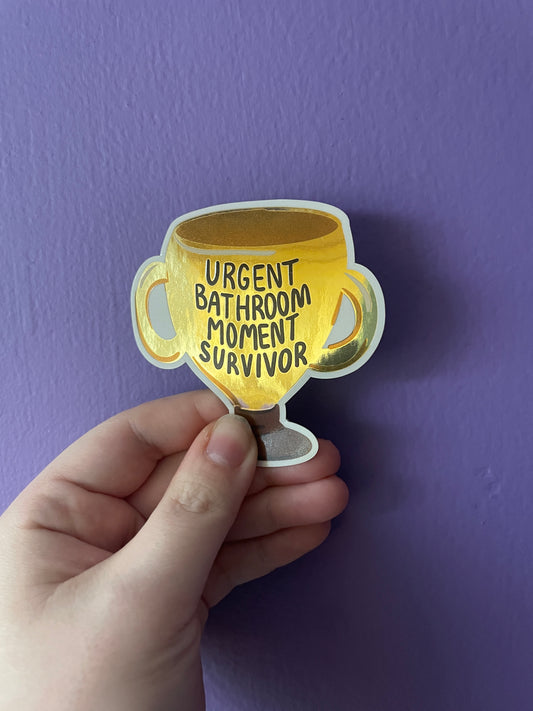 Urgent Bathroom Moment Survivor Metallic Gold Trophy Sticker